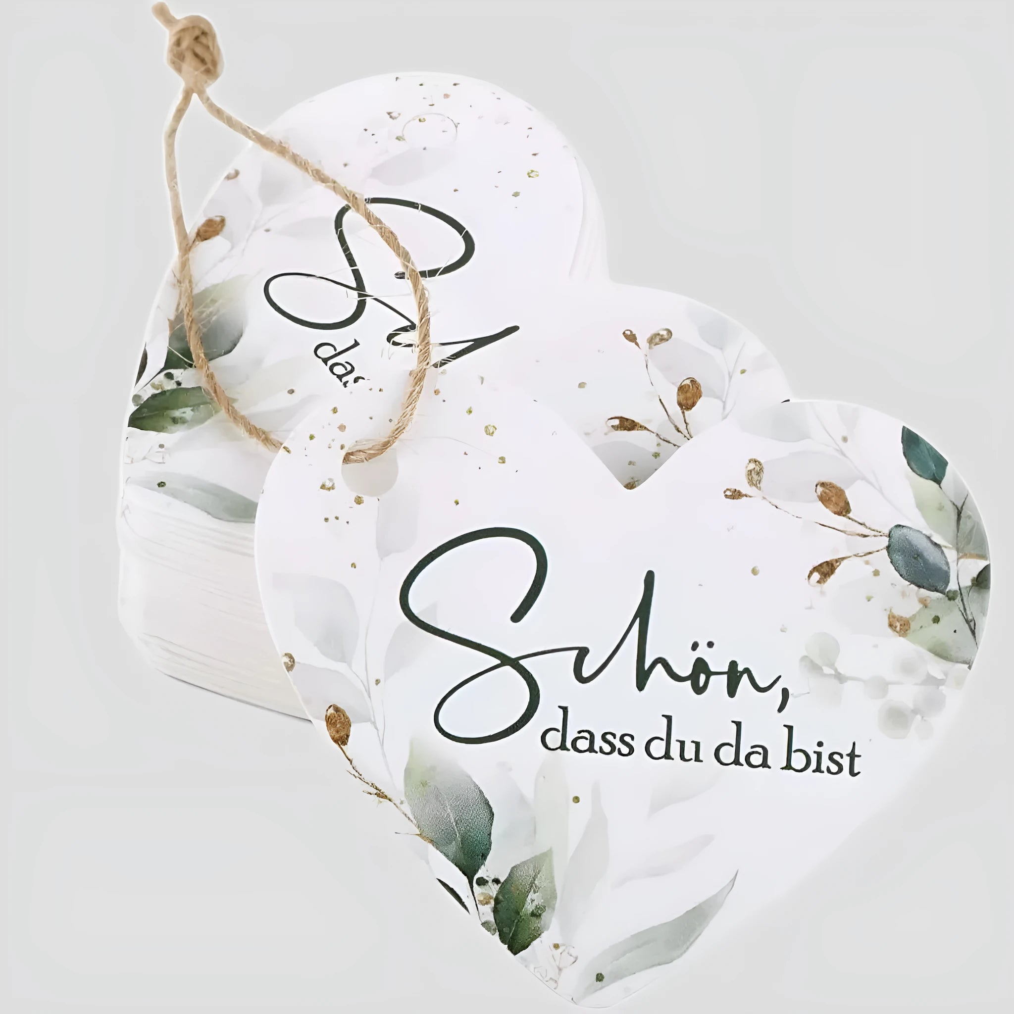 Pack of 50 flower heart-shaped paper gift tags in two decorative styles.