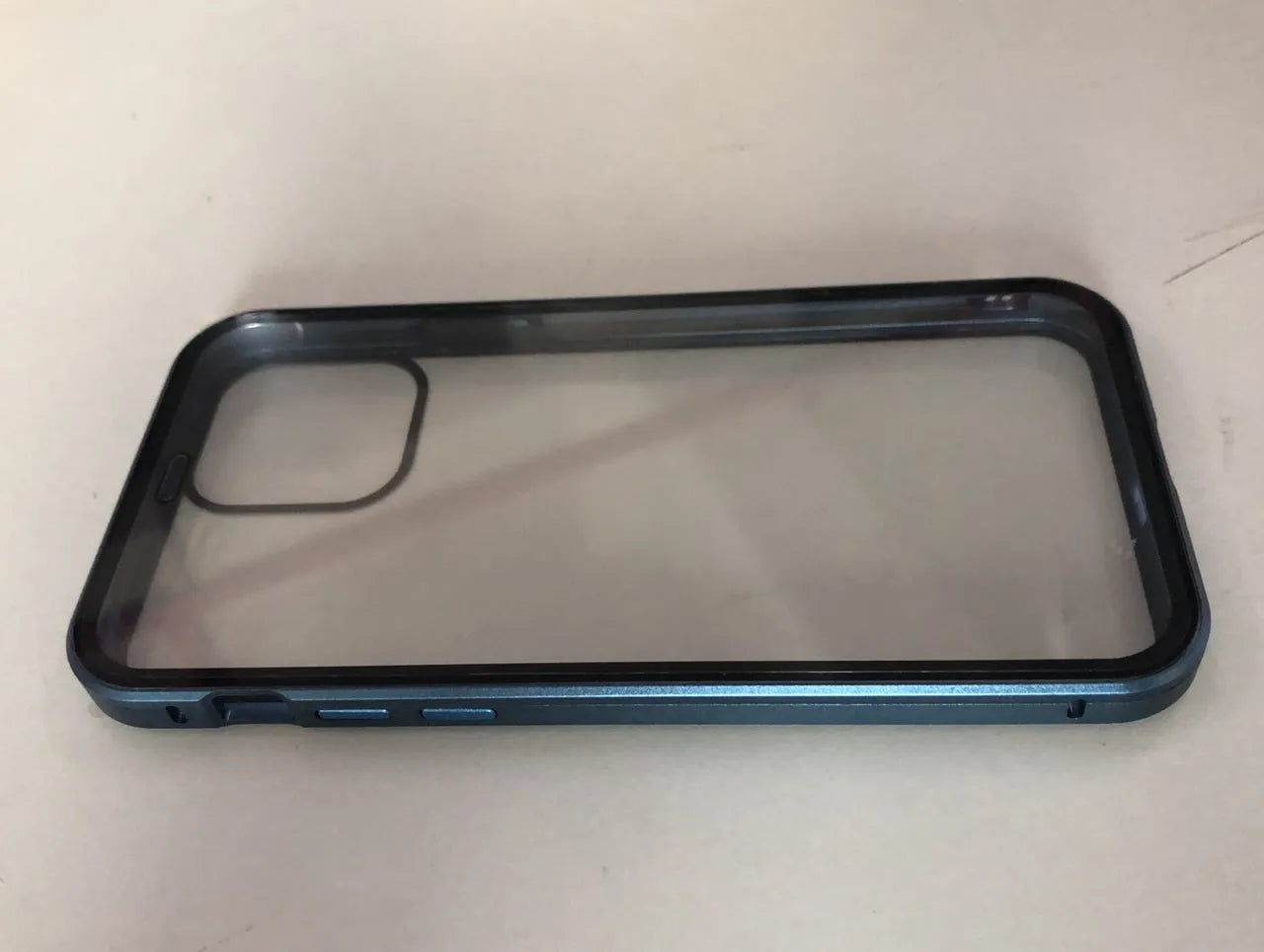 A glass clamshell anti-spy privacy case for iPhone, shown in a solid colour with a geometric design.