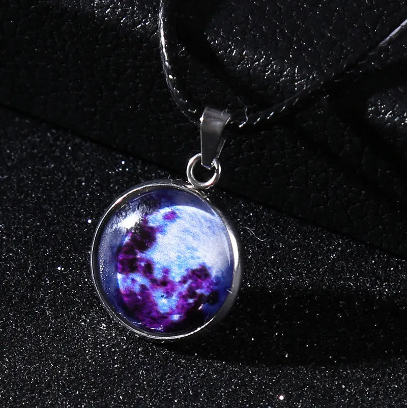 Alloy necklace with luminous glass pendant showing Christmas moon night sky and constellation design.
