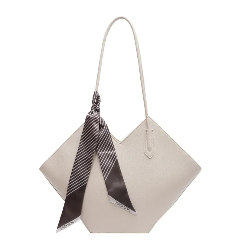 Women's large capacity shoulder bag in horizontal square shape showing black and brown colour options