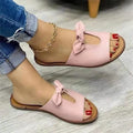 Ladies sandals with fish mouth style and bow detail in black, pink, or gold colours