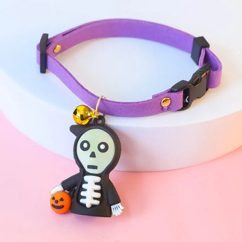 Halloween dog collar decoration in luminous ghost, luminous skull, or pumpkin man patterns on a polyester band.
