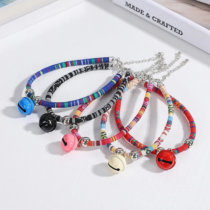 Ethnic pattern pet collar with bell feature for cats and dogs in various colours
