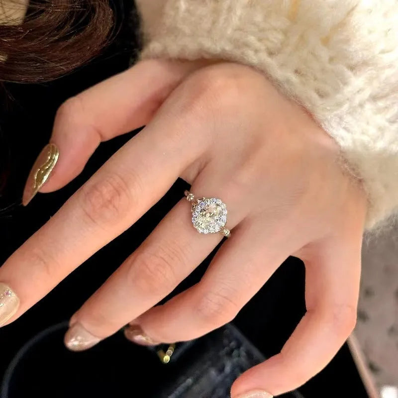 Silver geometric ring with diamond-shaped bridal bouquet pattern and adjustable opening