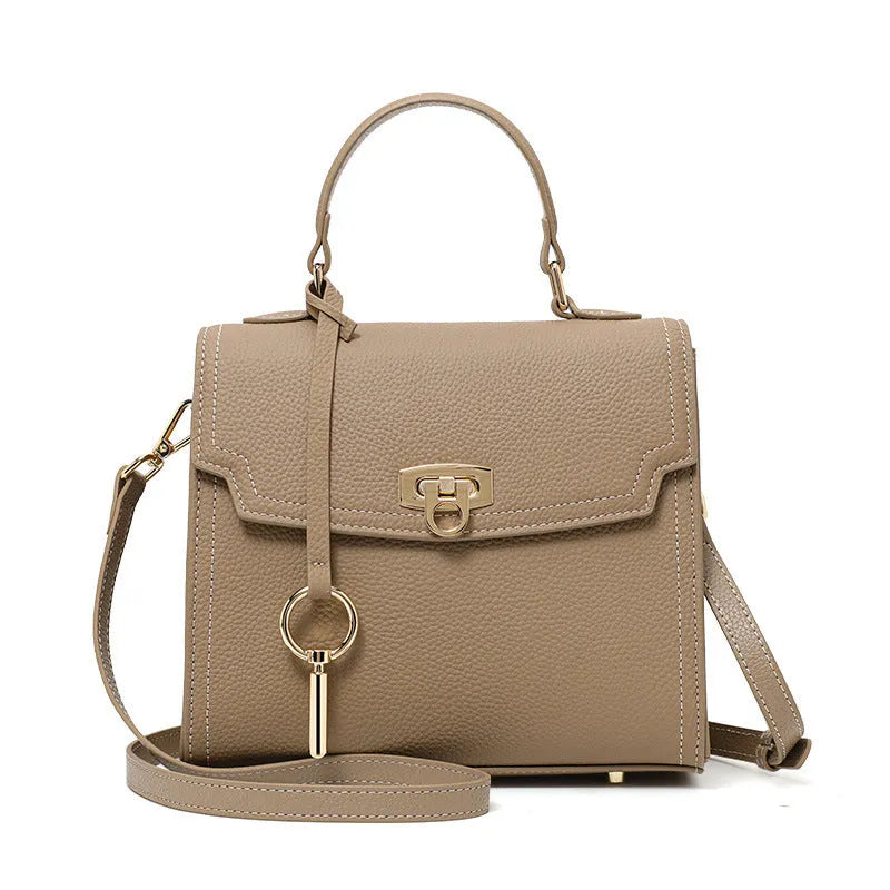 Elephant grey vintage lock handbag with litchi pattern leather and crossbody straps