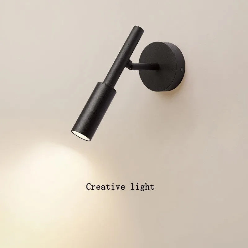 Black wrought iron wall lamp with modern design and three colour temperature lighting options