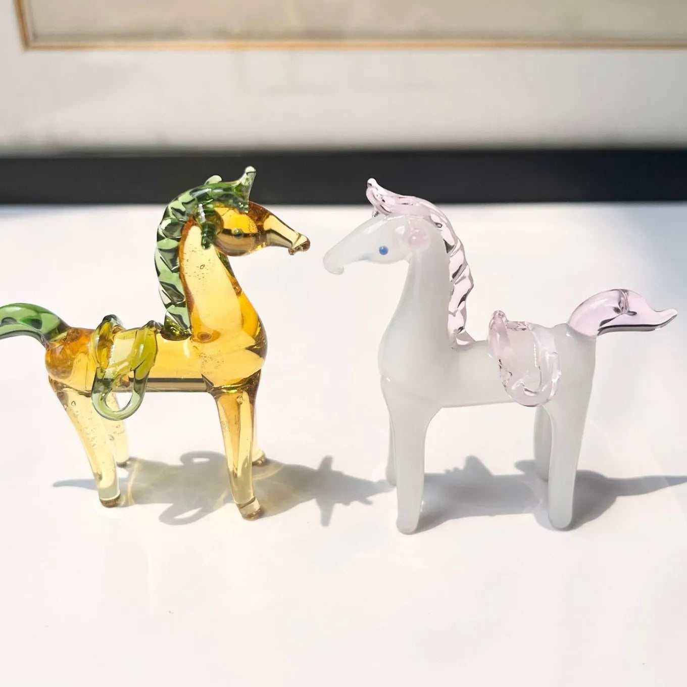 Brown glazed ceramic horse decoration on wooden desk with modern simplicity design