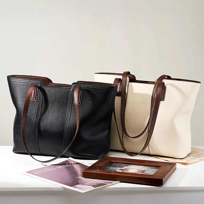 Women's genuine leather commuter shoulder bag with multiple internal zippered compartments in black colour