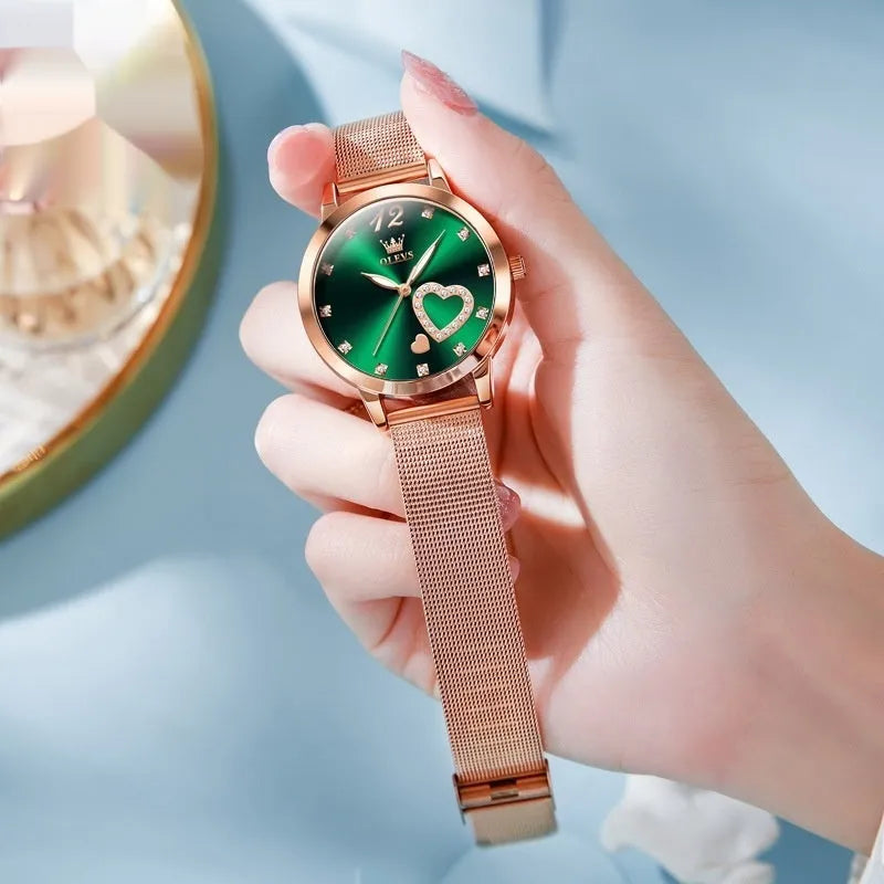 Women's fashion watch with rose gold mesh strap showing six dial colour options: white, black, blue, red, pink, green.