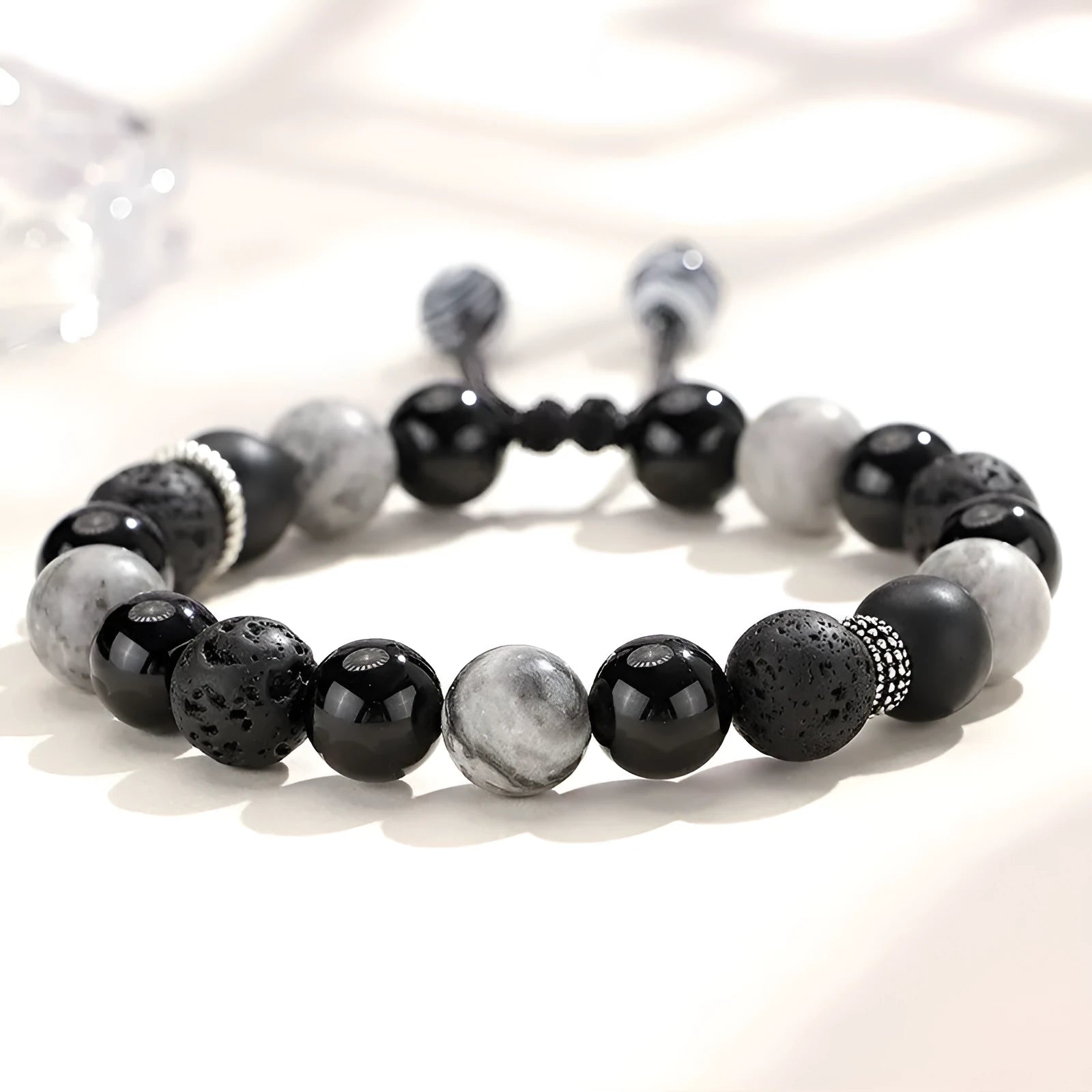 Black agate map stone bracelet with diamond-shaped volcanic rock beads