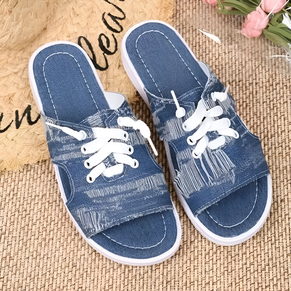 Blue Roman style women's canvas slippers with cloth lining and rubber soles