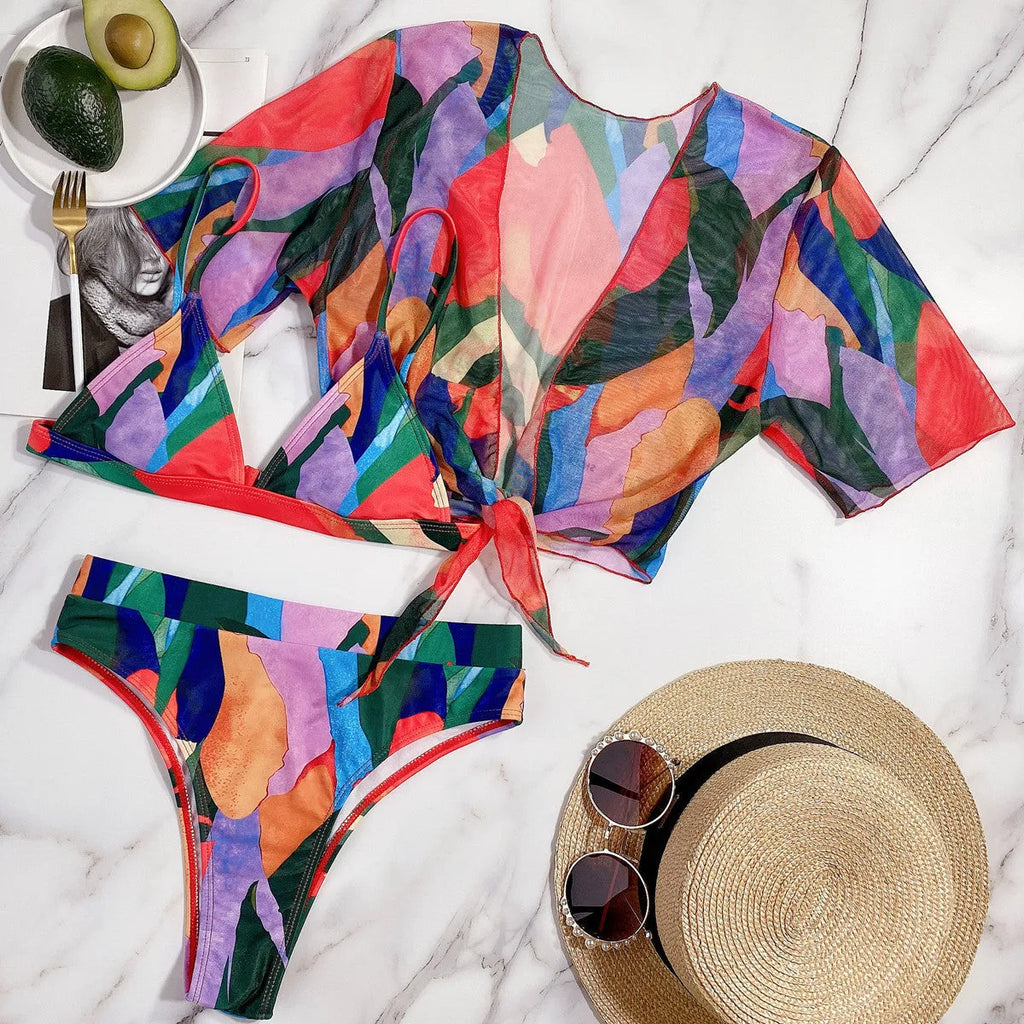 Red women's printed split swimsuit bikini made from nylon fabric.