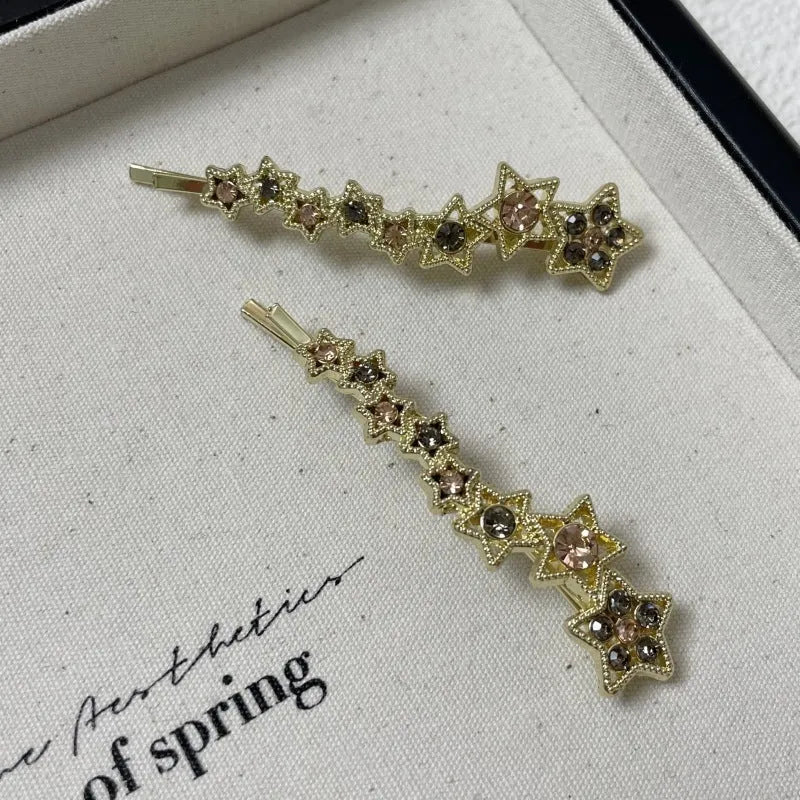 Gold rhinestone barrette with star charms for bangs and broken hairstyles