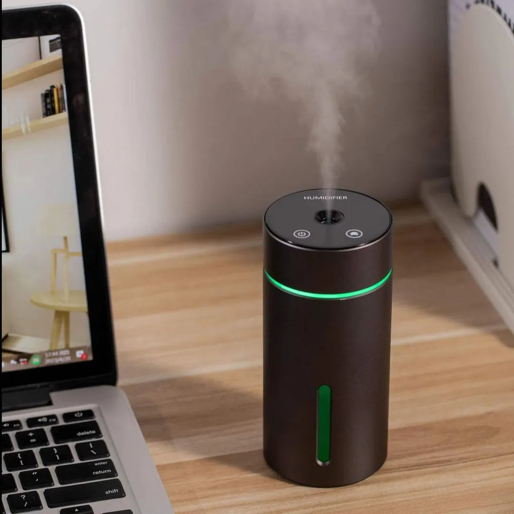 Black portable car humidifier and essential oil diffuser with aluminium construction and USB cable