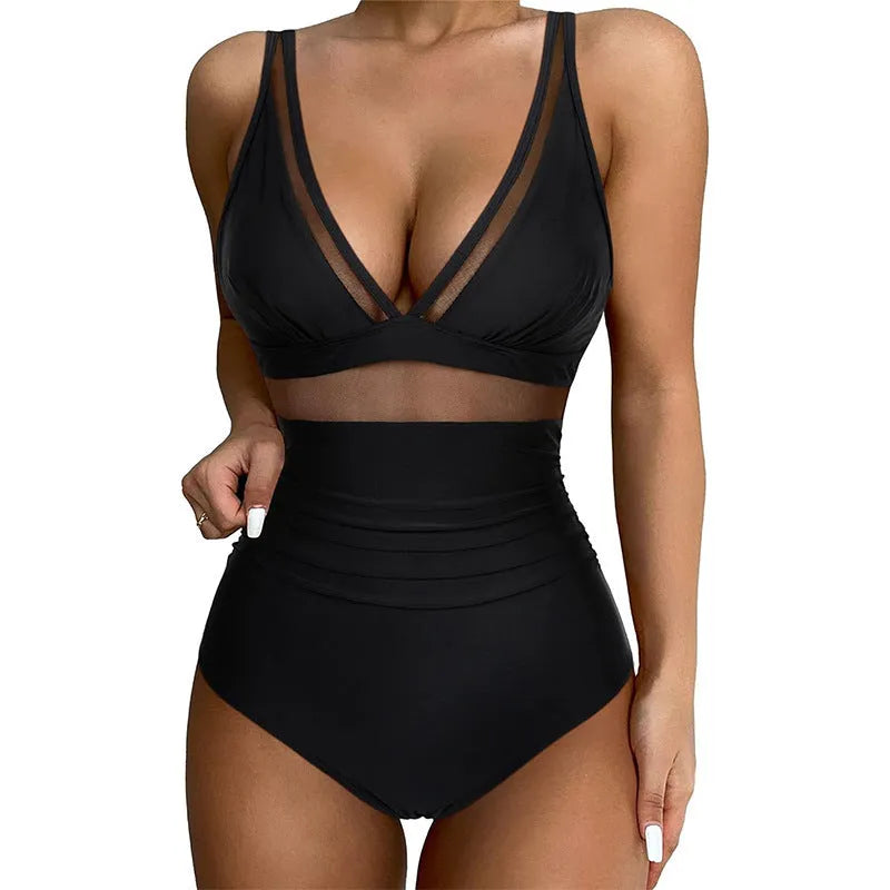 Black halter neck one-piece swimsuit with mesh detail, shown on model.