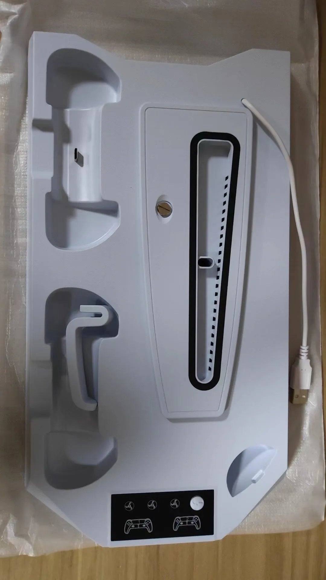 PS5 charging base radiator station in black or white with USB ports for controller charging and cooling functions