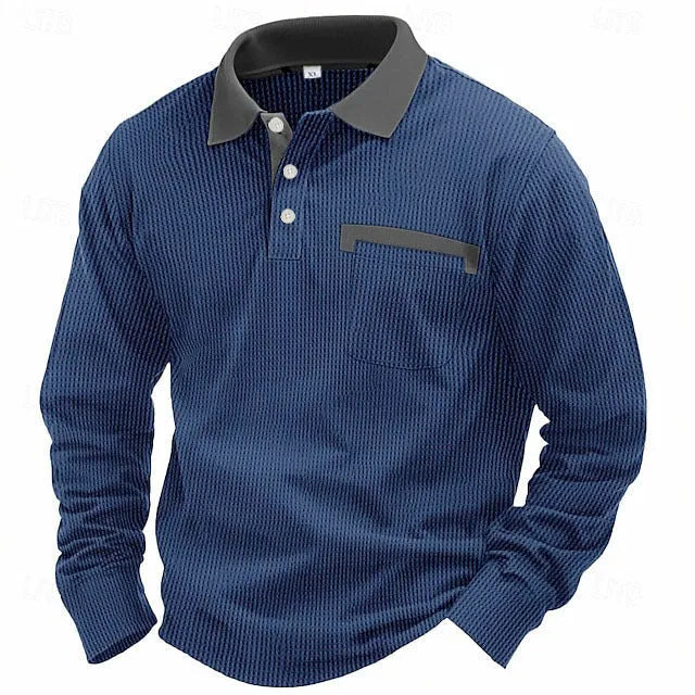 Man modelling a loose-fit long sleeve polo shirt with a waffle-texture fabric in a solid colour.