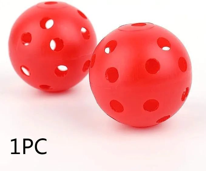 Six multi-colour 42mm golf practice balls in red, orange, blue, green, white, and yellow in a net.