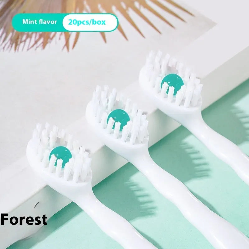 Box of Bead disposable toothbrushes showing mint, peach, and plum green tea flavour options.