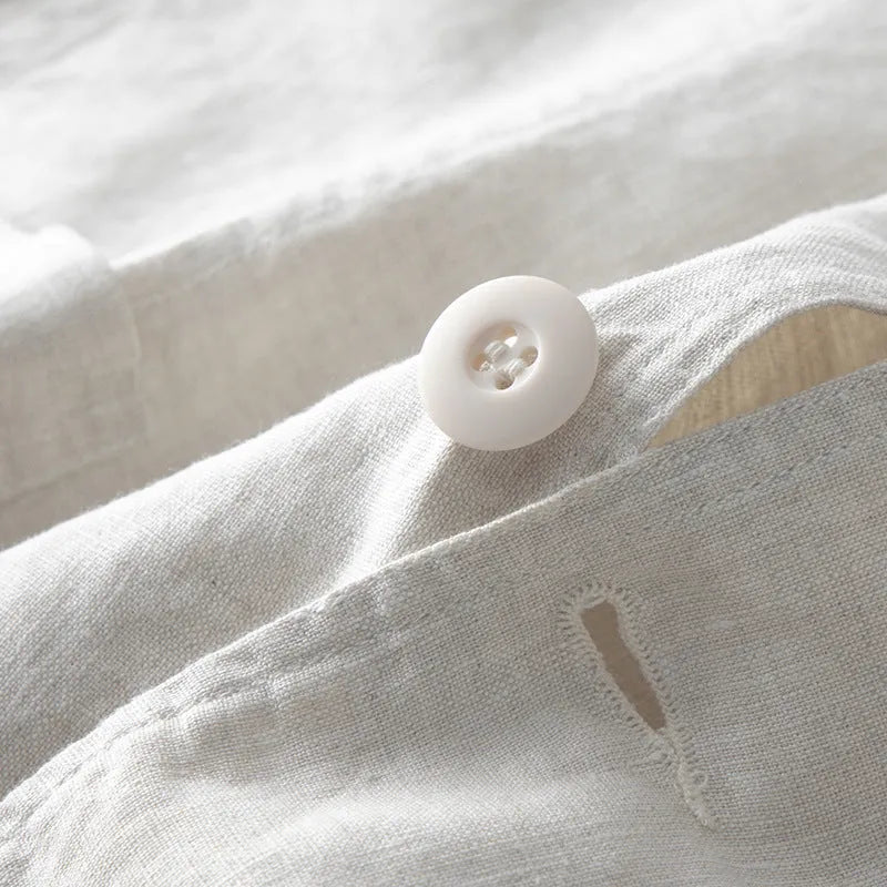 Men's loose-fit linen casual blazer jacket shown in available colours: white, black, natural linen, sky blue, and navy blue.