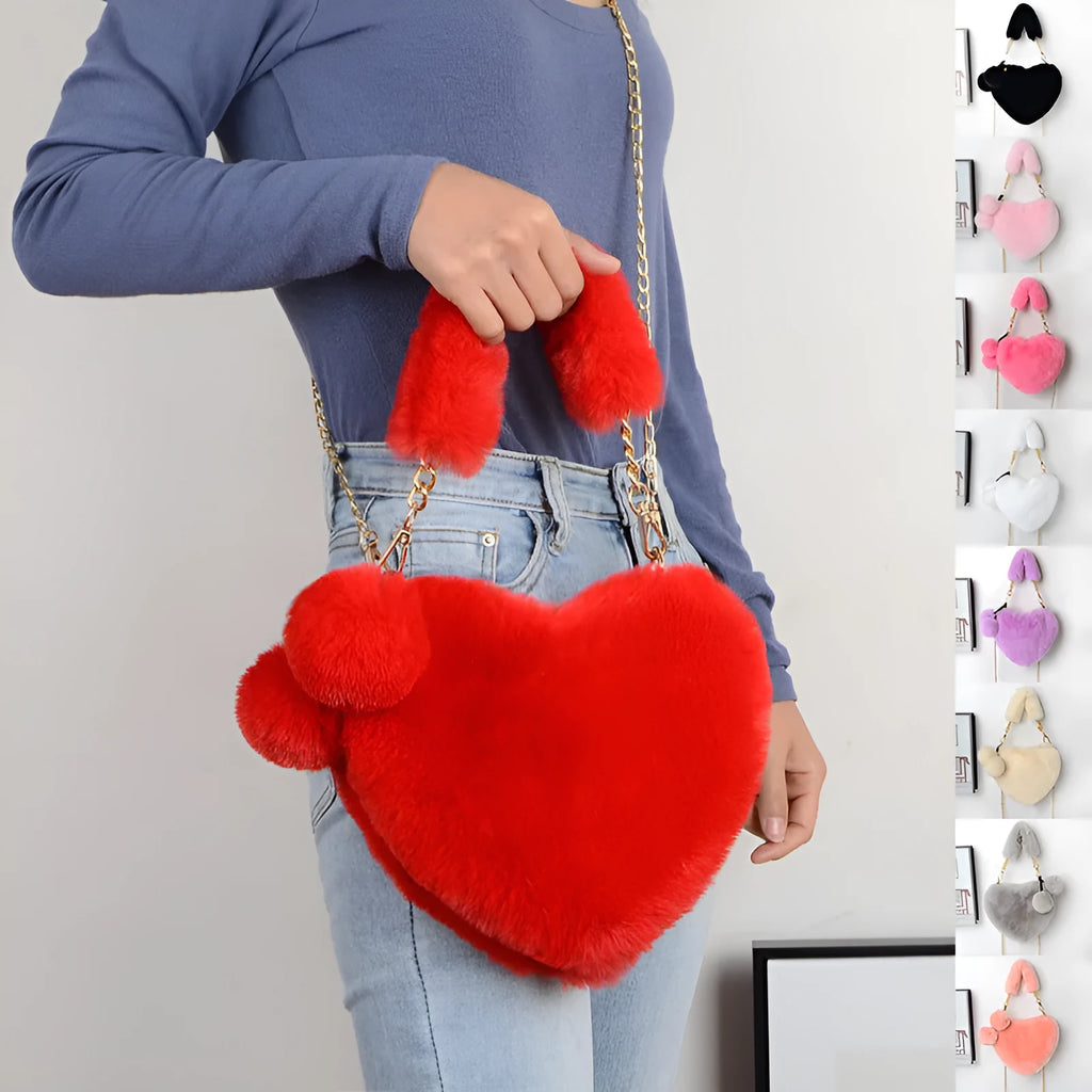A soft plush heart-shaped women's handbag with a zipper and a detachable shoulder strap in a choice of 14 colours.