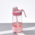 Grey cartoon patterned plastic cup with built-in straw showing 1000ml capacity marking