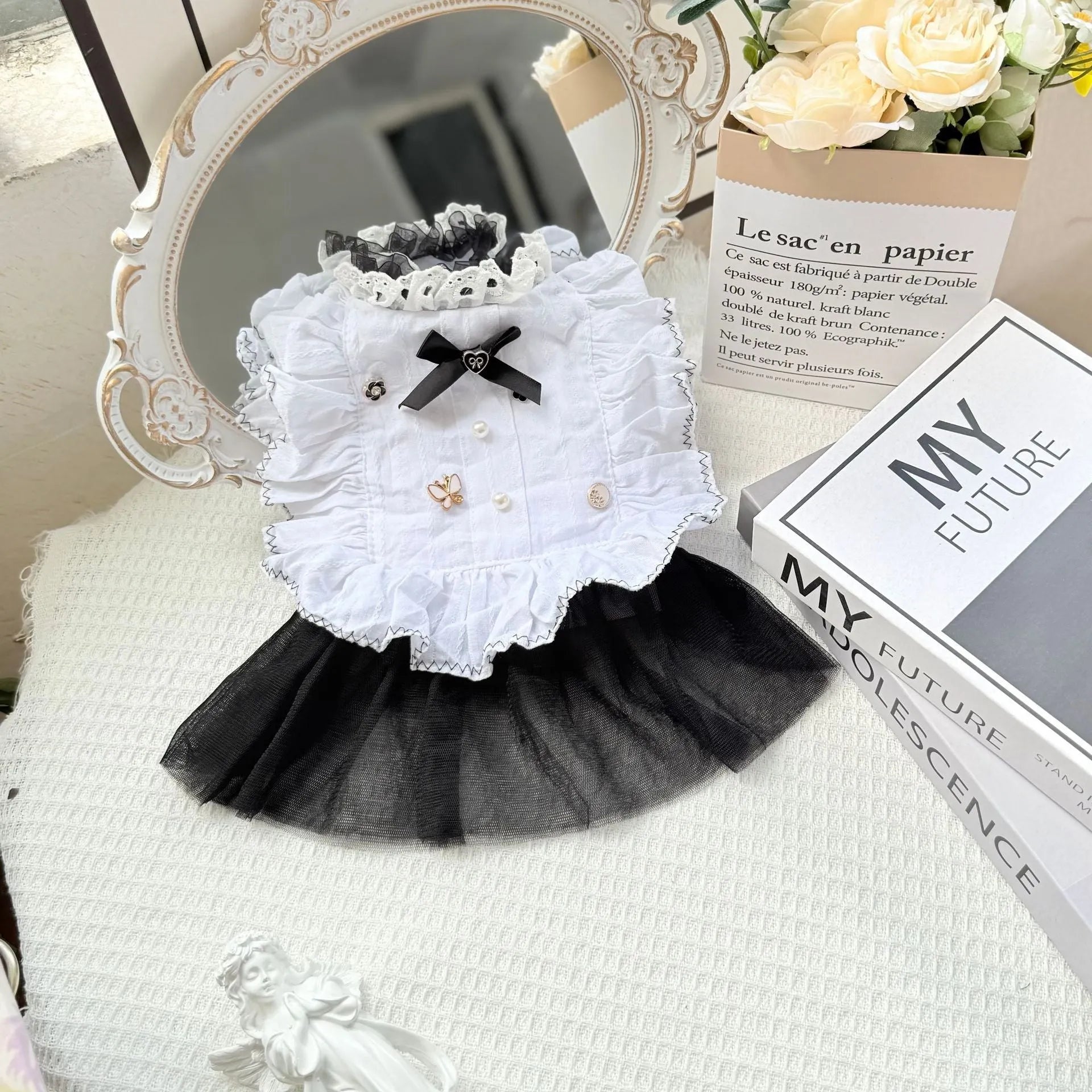 White polyester dog dress with gauze skirt in princess style, shown in size options for small dogs