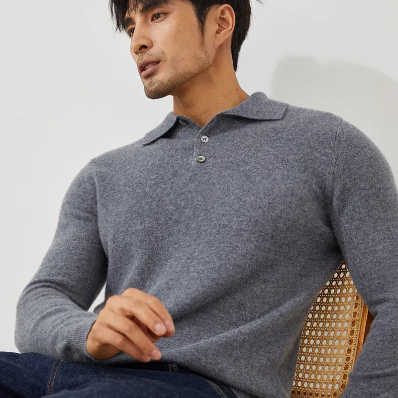 Man wearing a sapphire blue cashmere short sleeve pullover sweater with a polo collar.