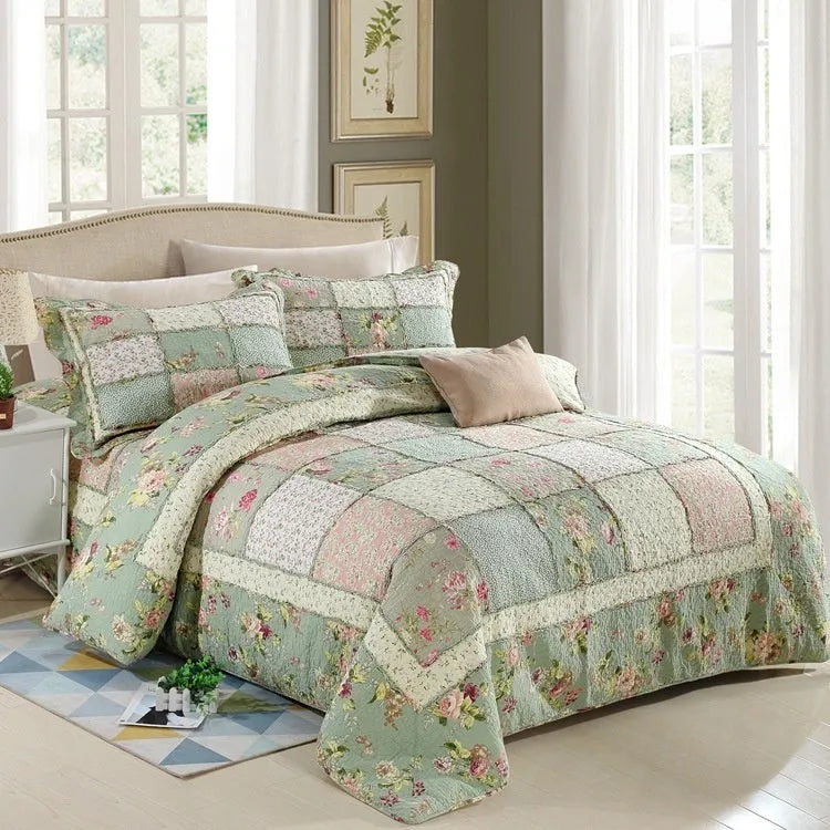Washed pure cotton quilted bedspread set with one large cover and two pillowcases on a bed.