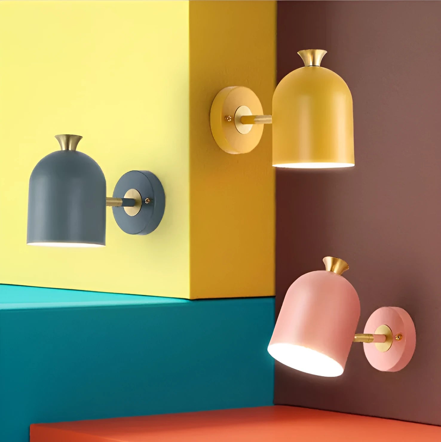 Blue aluminium single-head LED wall lamp mounted beside a bed.