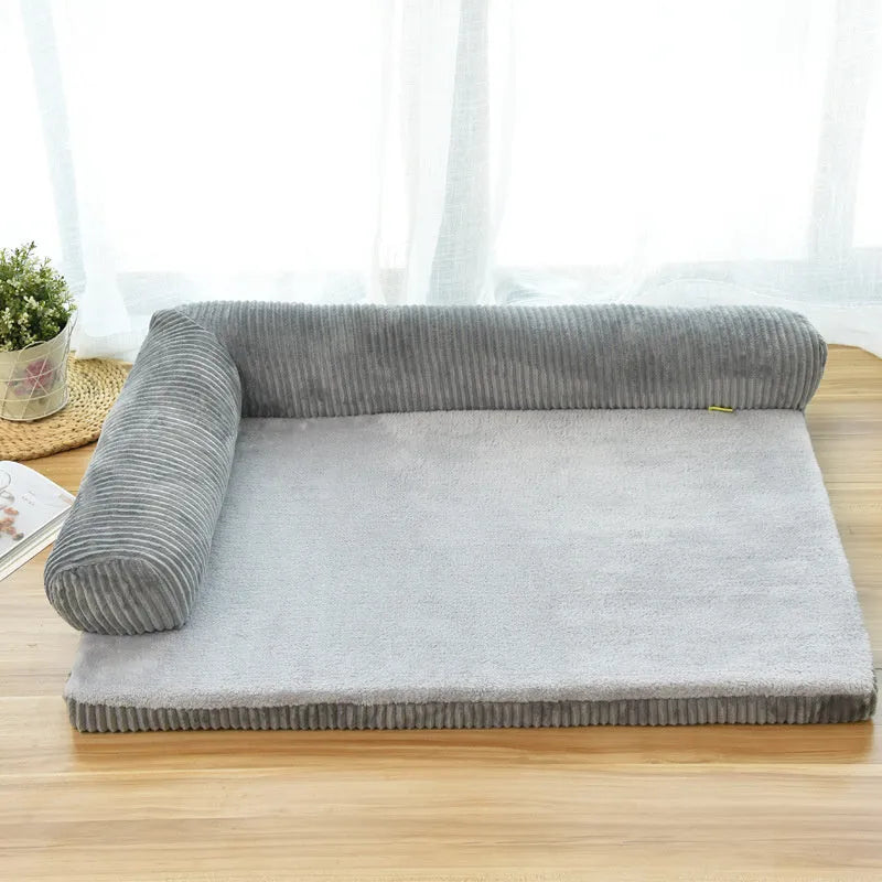 Corduroy pet sofa dog bed in grey colour with a non-slip base, shown in a bilateral style.