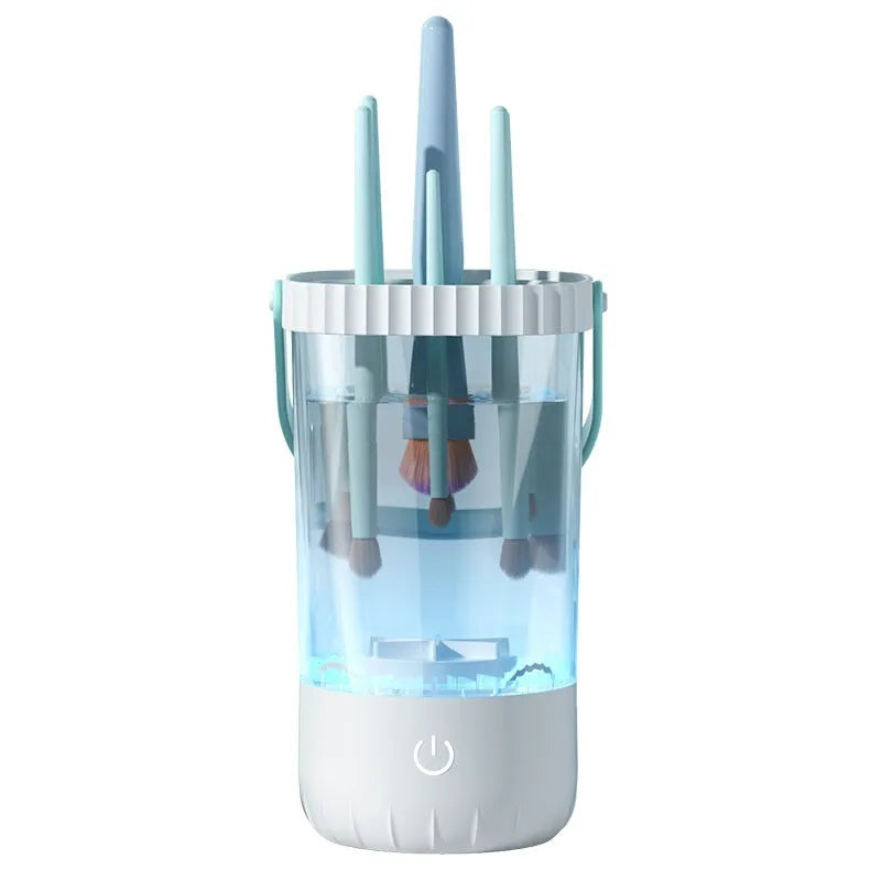 White plastic rechargeable makeup brush cleaning machine measuring 24cm with included data cable