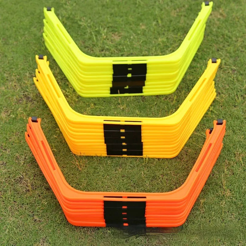 Set of six foldable hexagon football agility training rings in yellow green and orange plastic