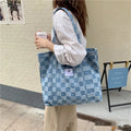 Large capacity Oxford cloth shoulder bag for women with a three-dimensional front pocket.