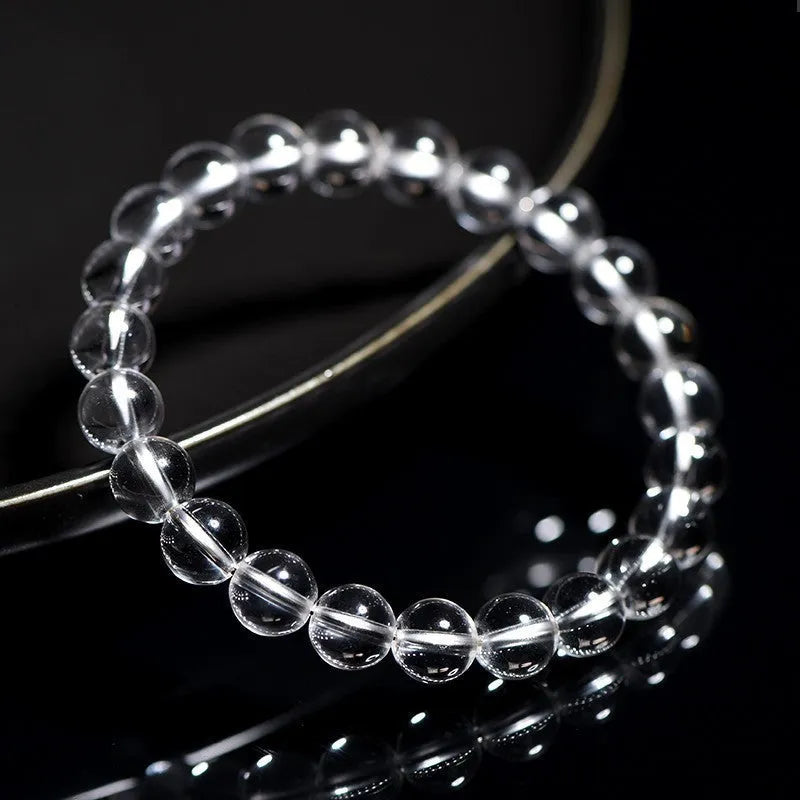 Natural Donghai crystal bracelet with round white beads, shown in a single circle design.