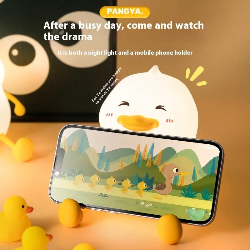 Chubby night light desk lamp with silicone phone holder in soft glow