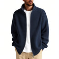 Men's loose-fit cardigan sweater in a grey colour, showing button front and long sleeves.