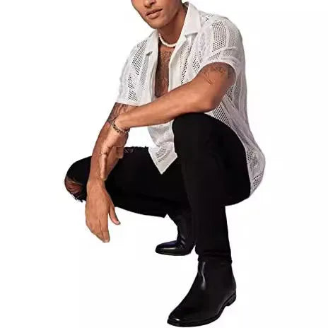 Man wearing a black jacquard knit short-sleeve cardigan shirt with button front.