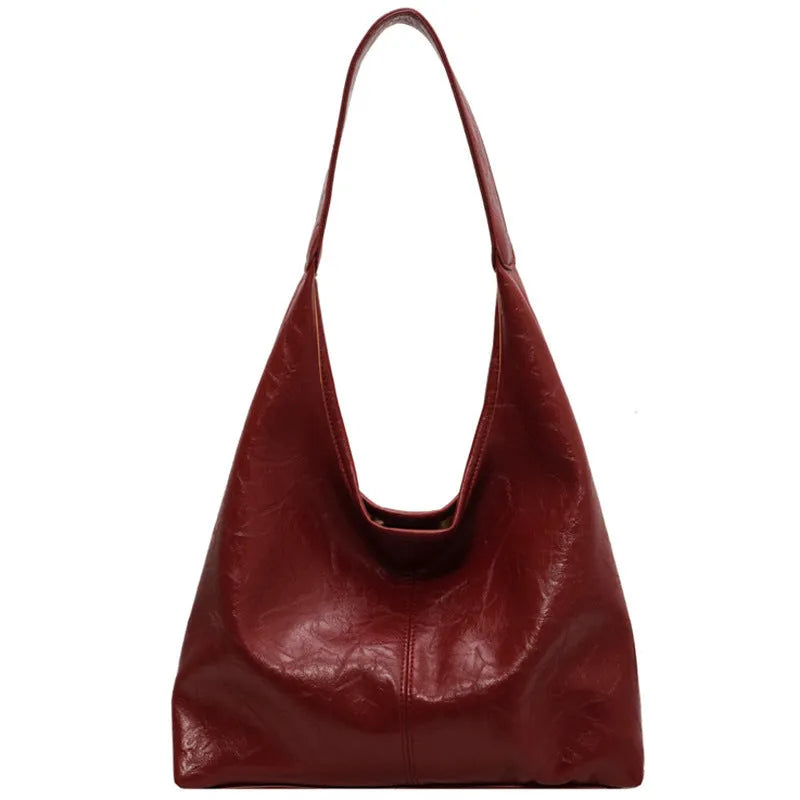 Casual soft leather shoulder bag with sandwich pockets in various colour options