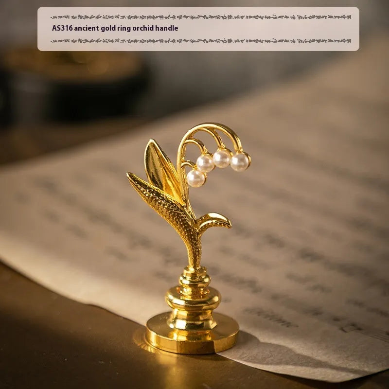 Wooden wax seal handle in a selection of different colour and decorative finishes.