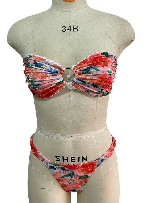 Printed tube top bikini set with lace detail and floral pattern in blue colour