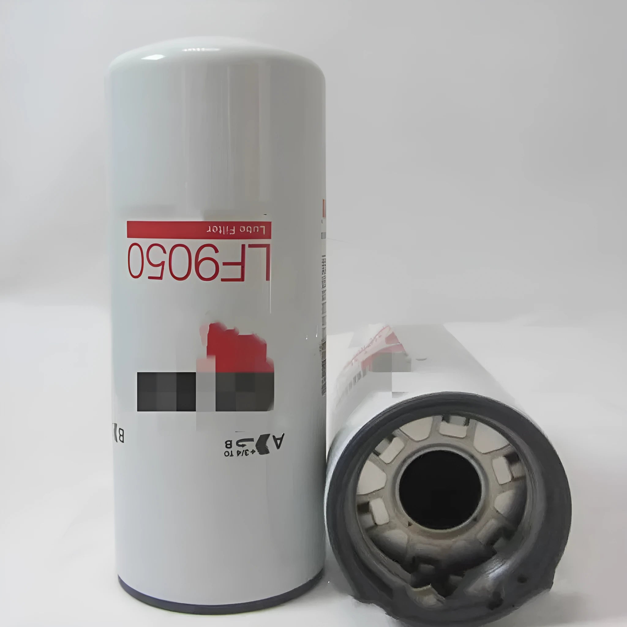 White metal diesel filter element FF5776 with 2mm inlet and outlet ports for automotive engine oil filtration