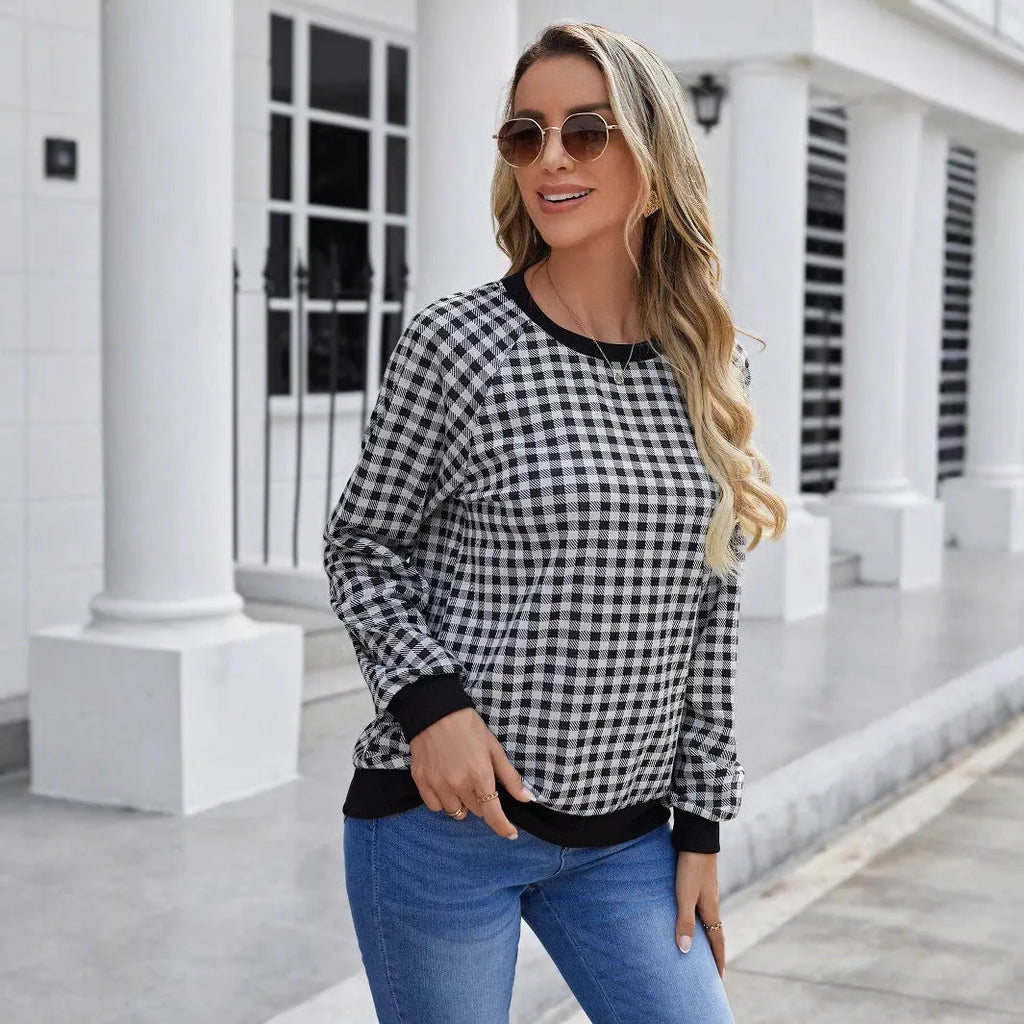 Black Japanese style plaid pullover sweater with long sleeves and printed pattern