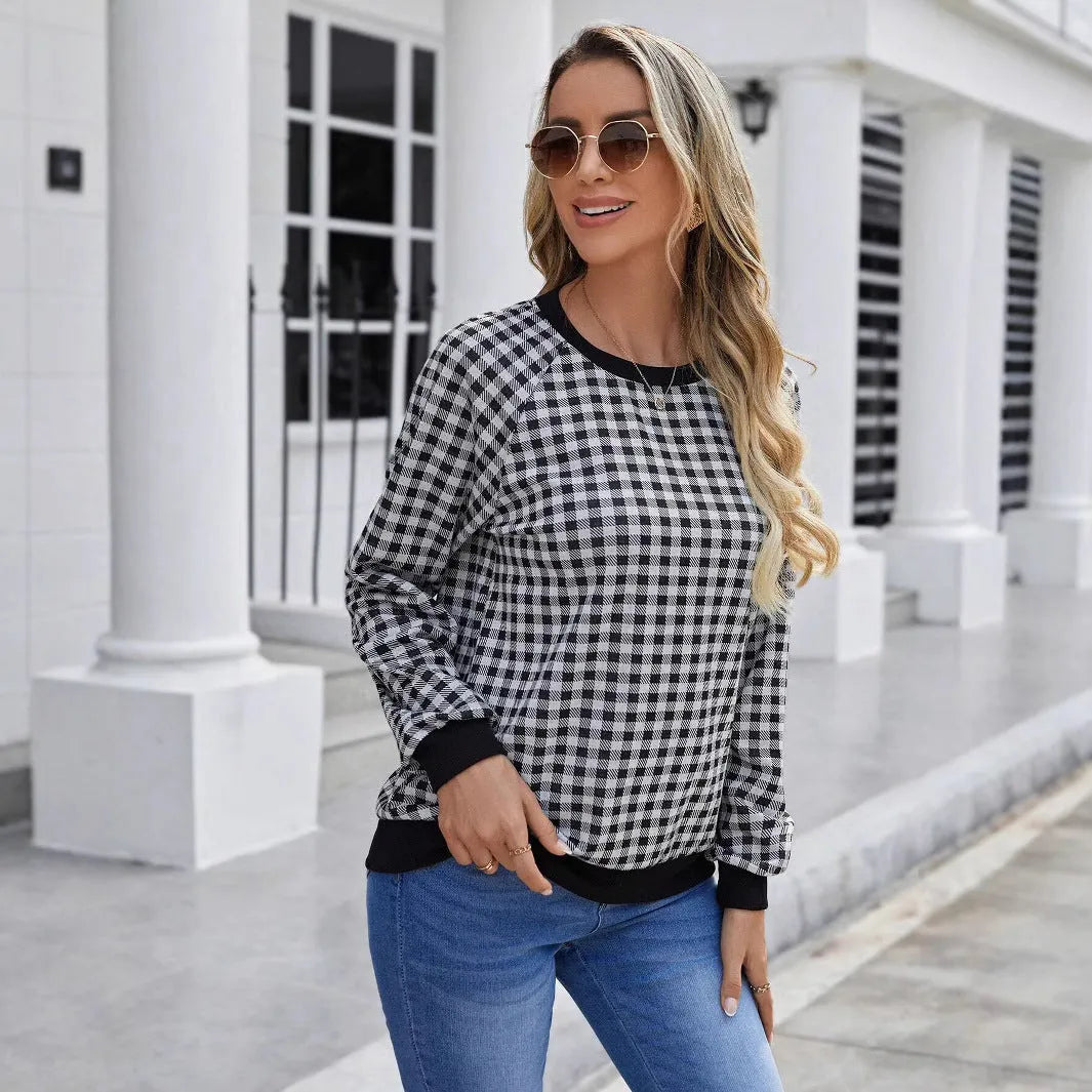 Black Japanese style plaid pullover sweater with long sleeves and printed pattern