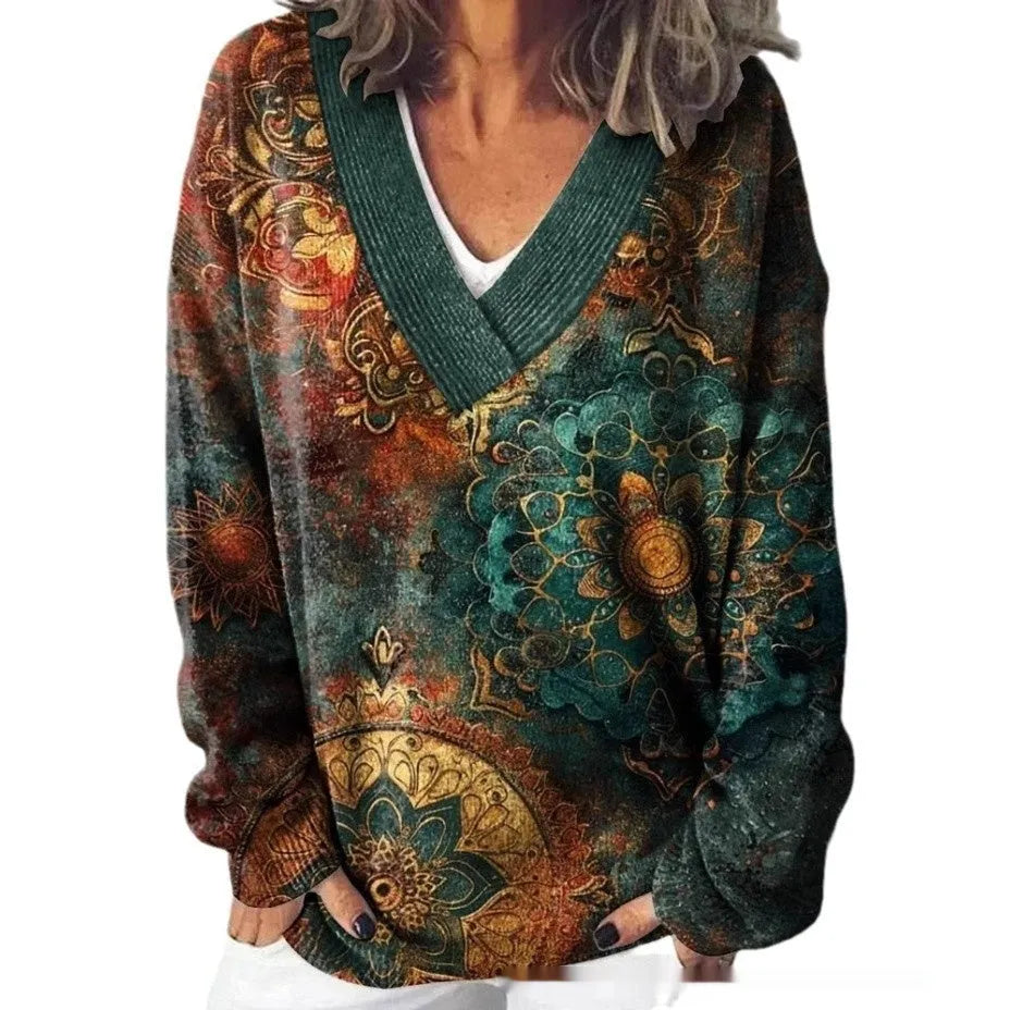 Women's V-neck long sleeve sweatshirt with a blue and white 3D floral print pattern.