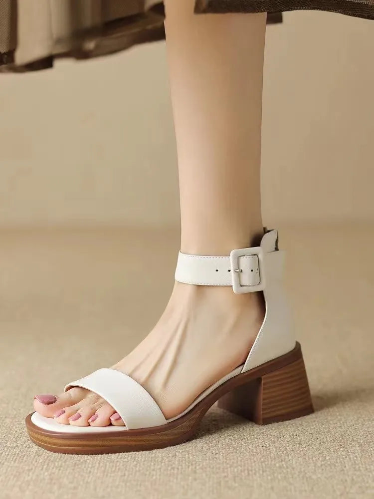 Women's white retro platform high heels with ankle strap and rounded toe design