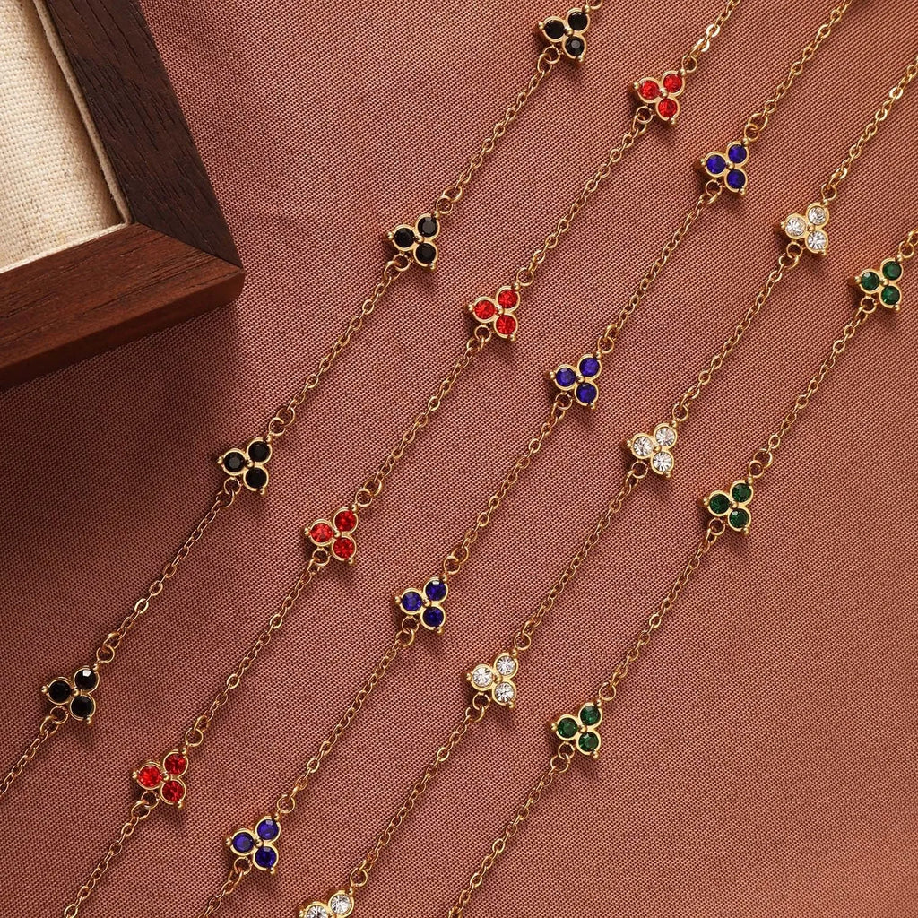 Women's geometric bracelet with triangular diamond cluster in gold or steel stainless steel with coloured stones