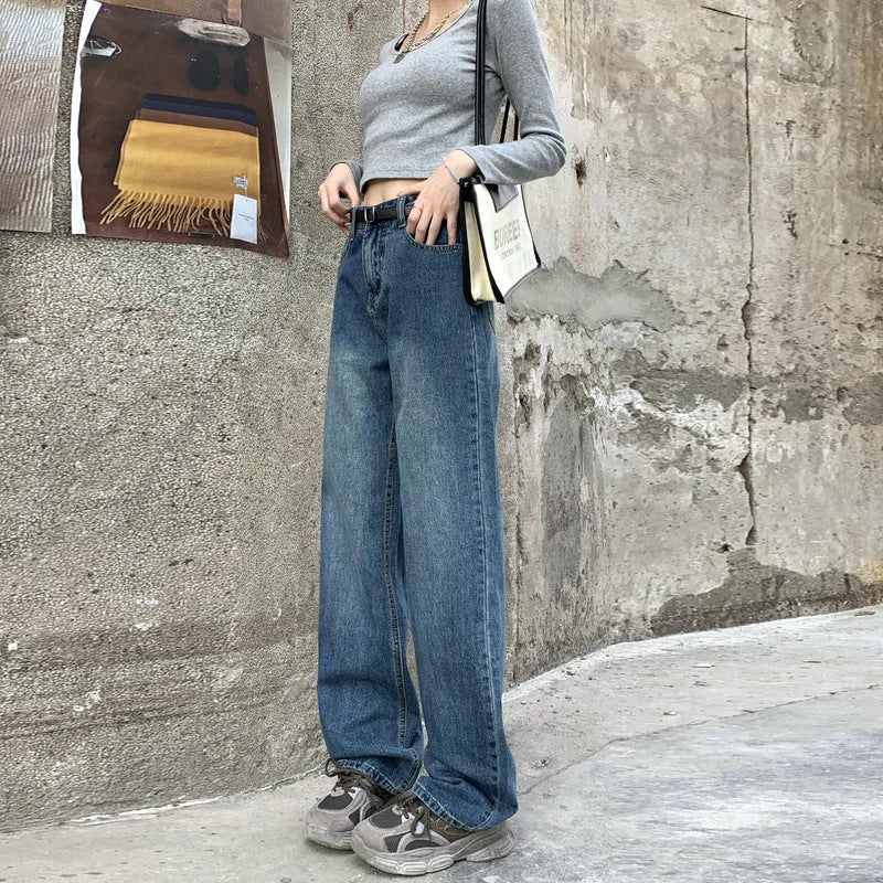 Women's high-waist straight leg jeans in retro blue denim showing three length variations