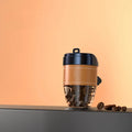 Coffee cup shaped plastic car air freshener in choice of five colours for vehicle interior use