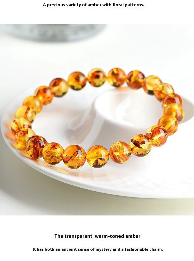 Natural yellow piebald amber bracelet with flower spot pattern for water purification